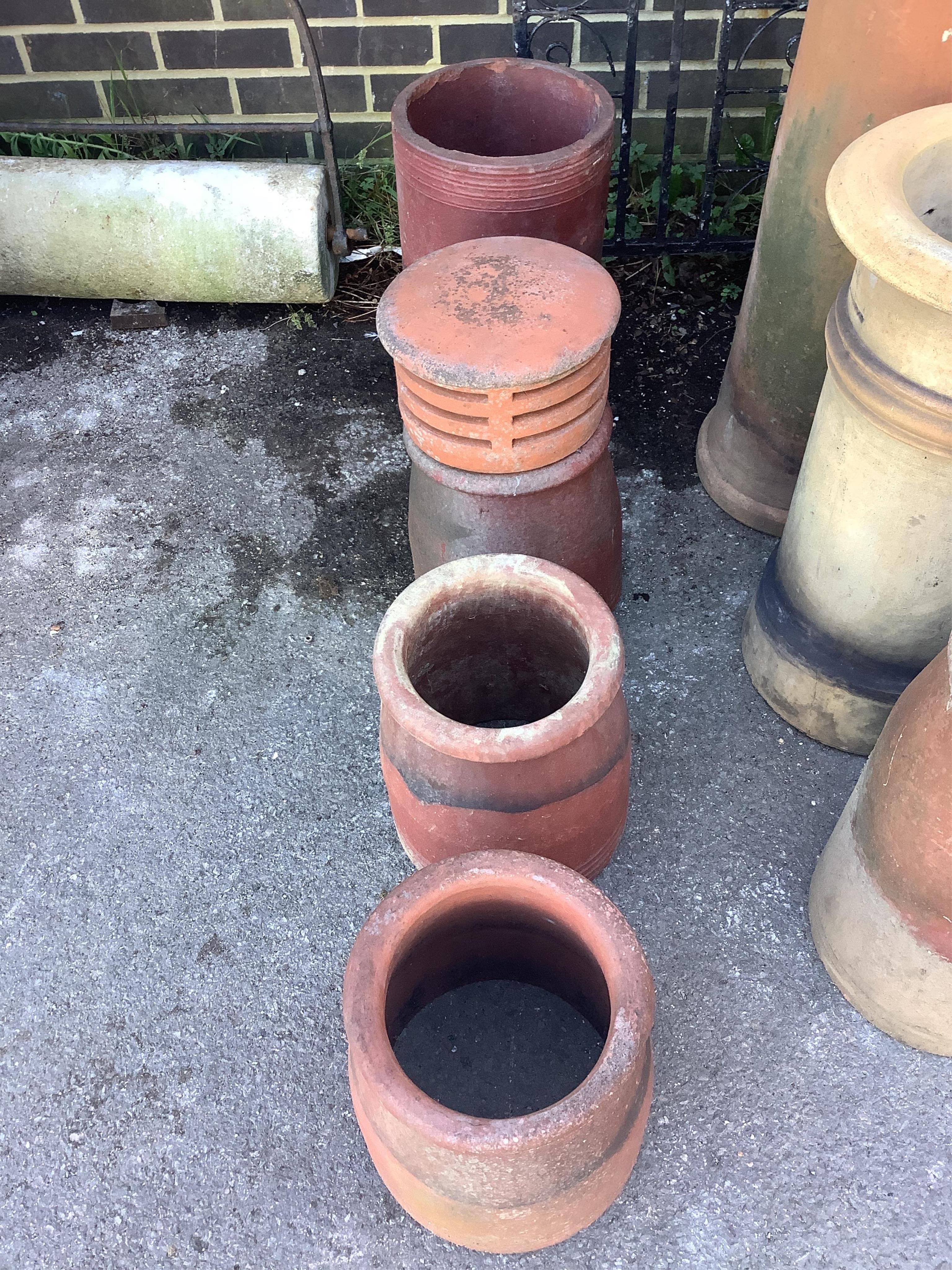 Four various chimney pots, largest height 46cm. Condition - fair